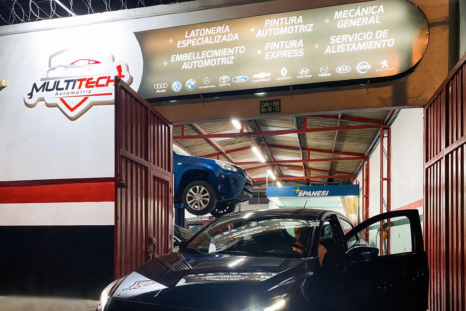 Fachada del taller Multitech Automotriz en la Calle 128A, Prado Veraniego, Bogotá